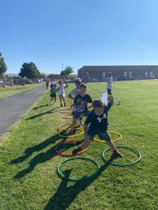 students running through rings